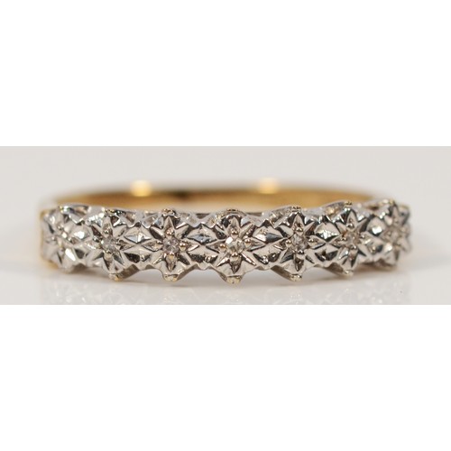 327 - A 9ct gold seven stone diamond ring, N 1/2, 1.7g