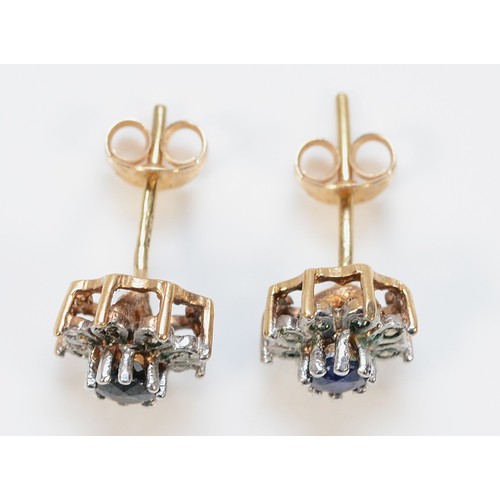 344 - A pair of 9ct gold sapphire and diamond floral cluster earrings with scroll backs, 8mm ,1.7g