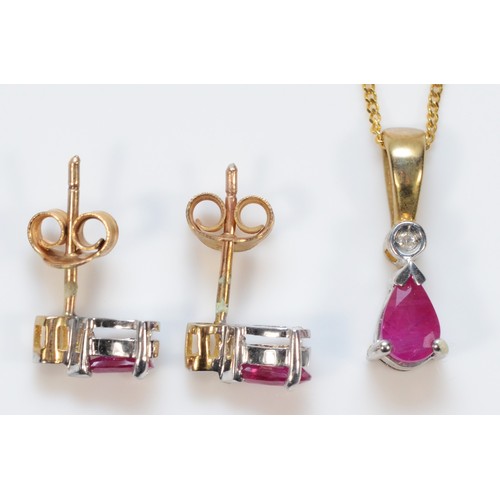 346 - A pair of 9ct gold ruby and diamond earrings with scroll backs, together with a matching pendant, 2.... 