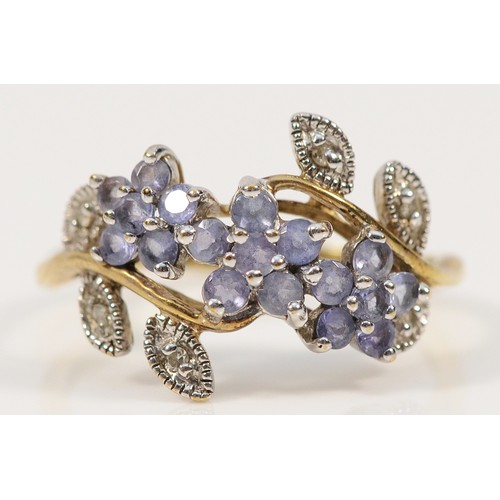 353 - A 9ct gold tanzanite and single cut diamond floral cluster ring, N, 2.1g