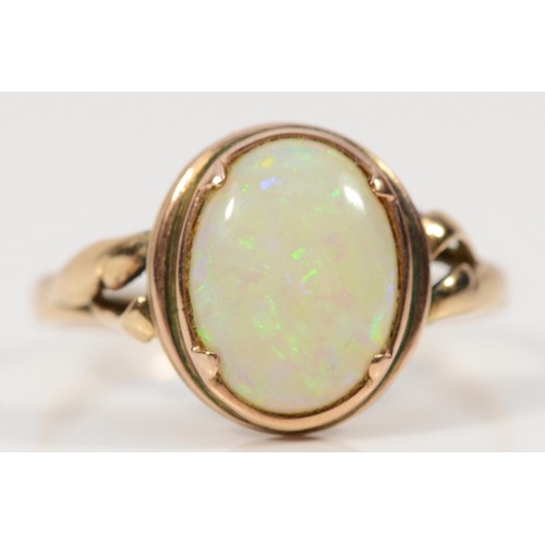 364 - A 9ct gold opal dress ring, 10mm x 8mm opal, Q, 2.4g