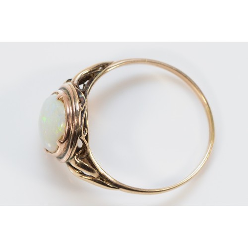 364 - A 9ct gold opal dress ring, 10mm x 8mm opal, Q, 2.4g