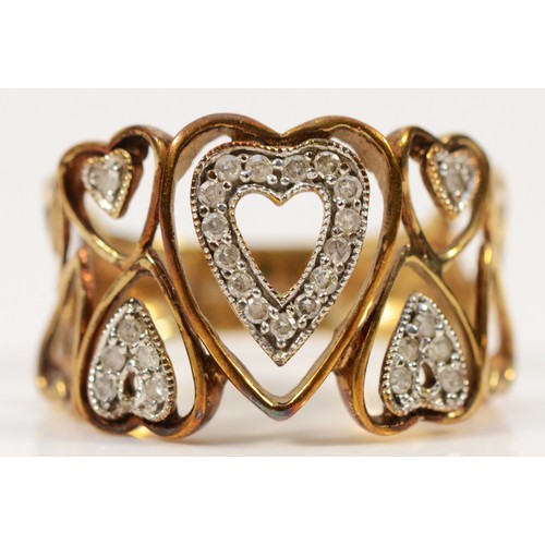 371 - A 9ct gold diamond open work heart ring, N, 3.2g