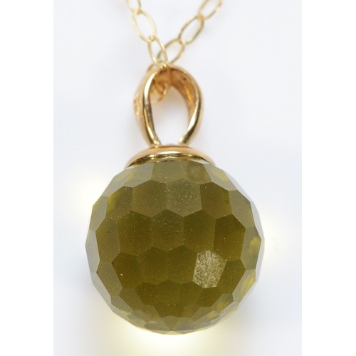 382 - A 9ct gold yellow gemstone sphere pendant on a chain, 10mm, 2.1g