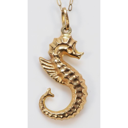 383 - A 9ct gold seahorse pendant with a chain, 20mm, 1.2g