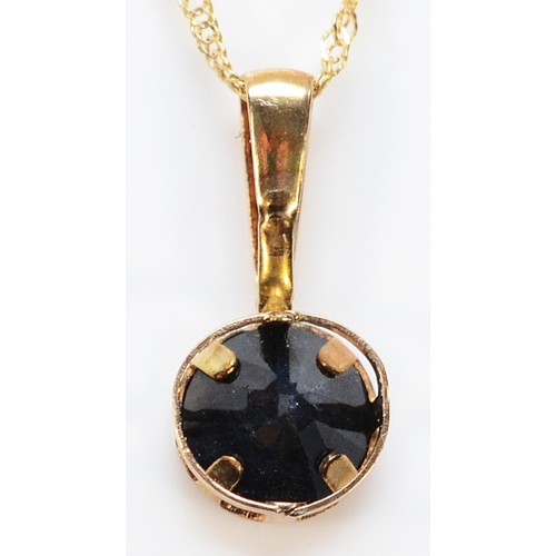 388 - A 9ct gold sapphire pendant with a chain, 11mm drop, 0.7g