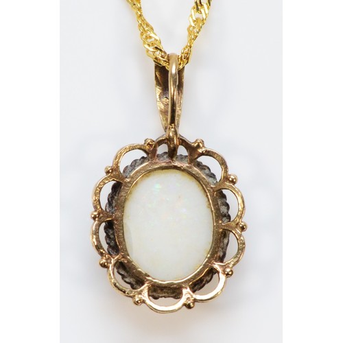 389 - A 9ct gold opal pendant, 20mm drop, 2.8g