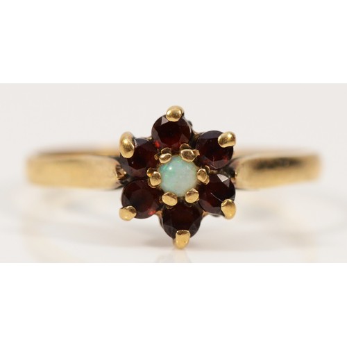 390 - A 9ct gold garnet and opal floral cluster ring, O, 1.6g