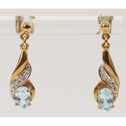 391 - A pair of 9ct gold diamond and blue gemstone drop earrings with scroll backs, 20mm, 1.7g