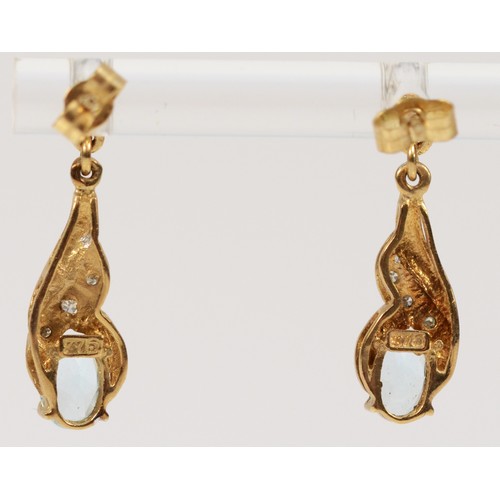 391 - A pair of 9ct gold diamond and blue gemstone drop earrings with scroll backs, 20mm, 1.7g