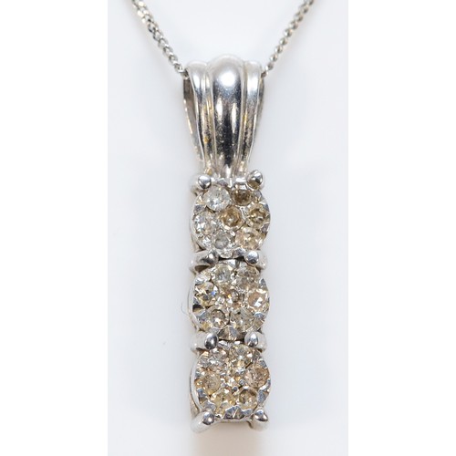 396 - A 9ct white gold diamond drop pendant with a chain, 18mm drop, 1.4g