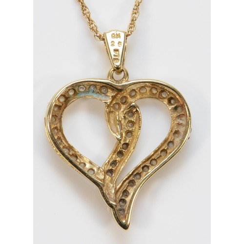 398 - A 9ct gold diamond heart pendant with a chain, 20mm, 2.9g