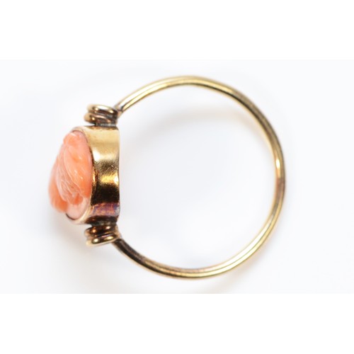 405 - An unhallmarked gold coral cameo dress ring, O 1/2, 2.5g