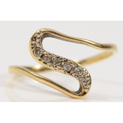 413 - A 9ct gold diamond twist dress ring, hallmarks worn, M, 1.3g