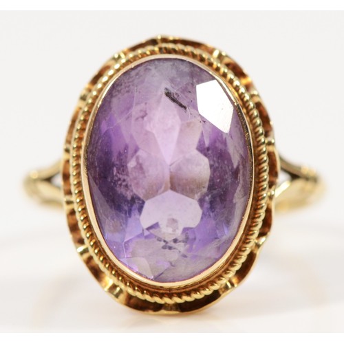 416 - A 9ct gold amethyst cocktail ring, 13mm x 9mm, M, 3.8g