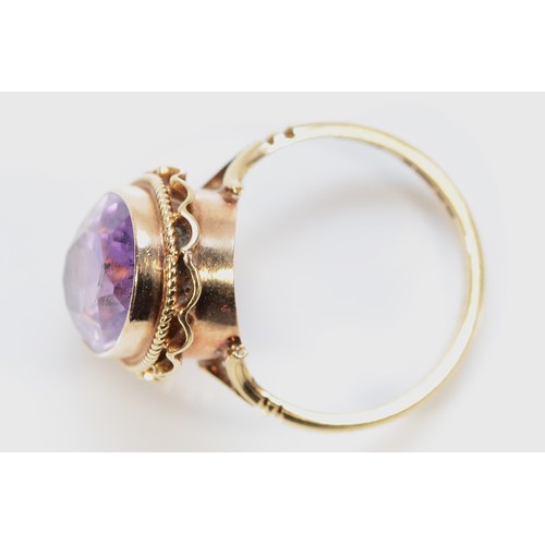 416 - A 9ct gold amethyst cocktail ring, 13mm x 9mm, M, 3.8g