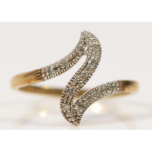 418 - A 9ct gold diamond twist dress ring, P, 1.9g