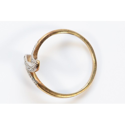 418 - A 9ct gold diamond twist dress ring, P, 1.9g