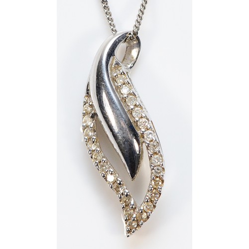 429 - A 9ct white gold diamond leaf shaped pendant with a chain, 23mm, 2.5g