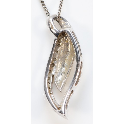 429 - A 9ct white gold diamond leaf shaped pendant with a chain, 23mm, 2.5g