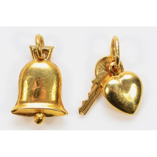 440 - A 9ct gold bell charm, with a 9ct gold key & heart charm, 1.3g