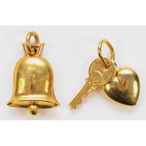 440 - A 9ct gold bell charm, with a 9ct gold key & heart charm, 1.3g