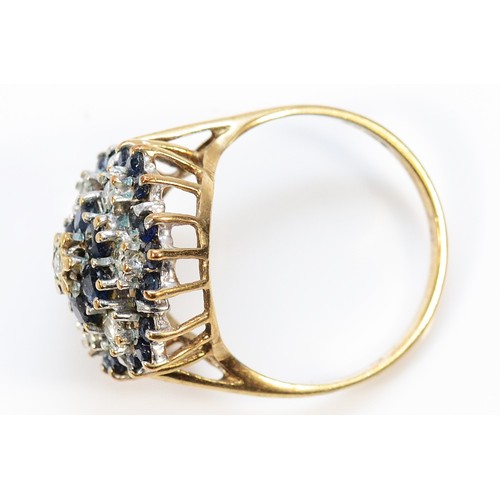 447 - A 9ct gold sapphire and diamond cluster ring, P, 3.8g