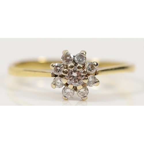 449 - A 585 gold brilliant cut diamond floral cluster ring, J 1/2, 1.5g