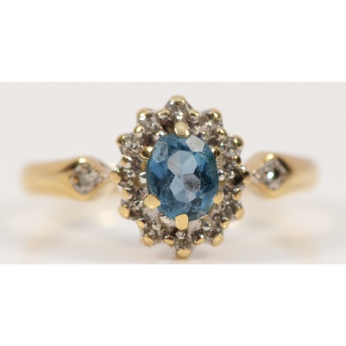 451 - A 9ct gold diamond and topaz cluster ring, J, 1.8g