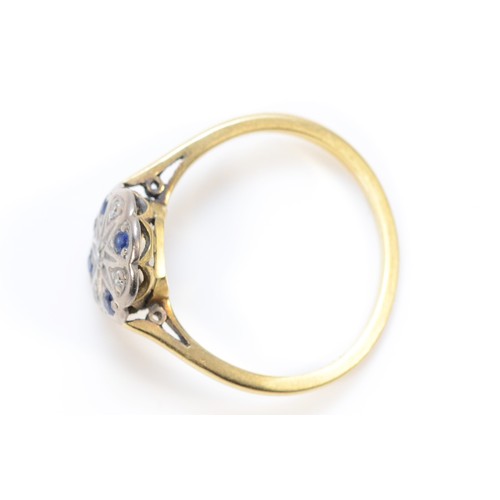 466 - An 18ct gold Art Deco diamond and sapphire cluster ring, M, 2.6g