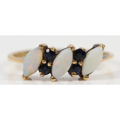 470 - A 9ct gold sapphire and opal seven stone ring, L, 1.5g