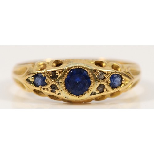 476 - An 18ct gold old cut diamond and blue gemstone seven stone ring, Birmingham 1911, N, 2.3g