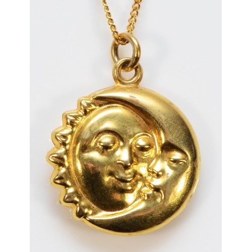 480 - A 9ct gold sun and moon pendant with chain, 15mm, 1.8g