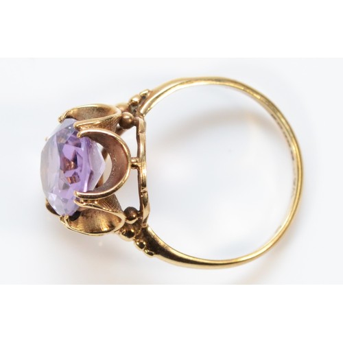 501 - A 9ct gold amethyst cocktail ring, 12mm x 9mm, L 1/2, 2.9g