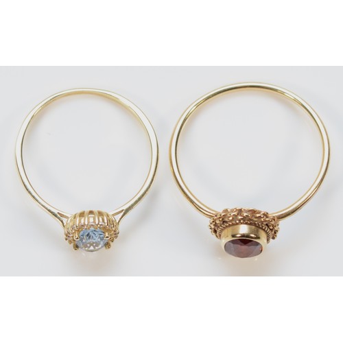 509 - A 9ct gold red gemstone dress ring, N, together with a 9ct gold blue and white gemstone dress ring, ... 