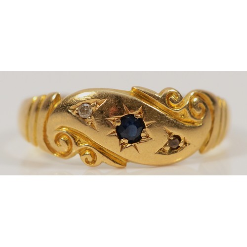 510 - A 15ct gold diamond and sapphire dress ring, M, 1.7g