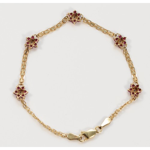 511 - A 9ct gold ruby and diamond floral bracelet, 18cm, 2.9g