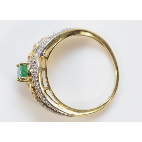 513 - A 585 gold diamond and emerald dress ring, O 1/2, 3.5g