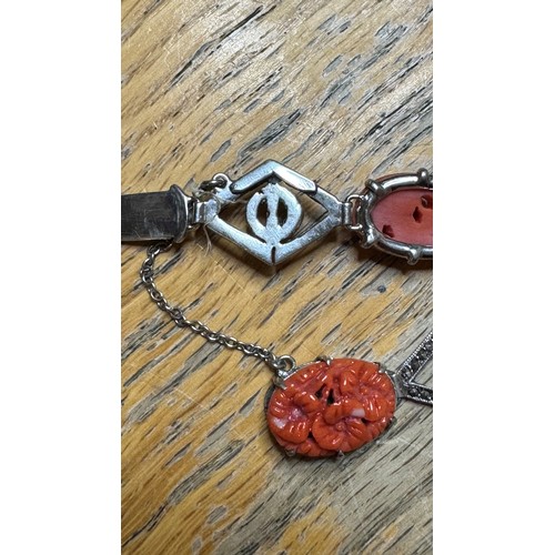 158 - A sterling silver, coral and marcasite bracelet, with a sterling silver and coral brooch, 55mm, 20g