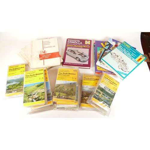 A collection of miscellaneous items including several maps and car ...