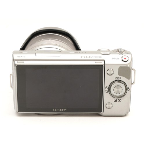 A Sony NEX-5 mirrorless digital camera with a Sony SteadyShot f/3.5-5.6 ...