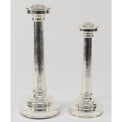 4 - A Greek 925 silver candlestick by ZOARTAS, with tapering stem having a hammered finish, raised on a ... 