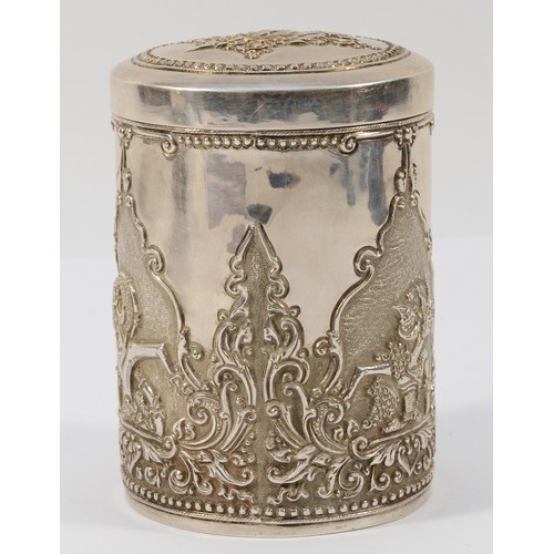 3 - An Indonesian Yogya 800 standard silver repousse lidded jar, signed UD, Deluxe within a flower, 7 x ... 