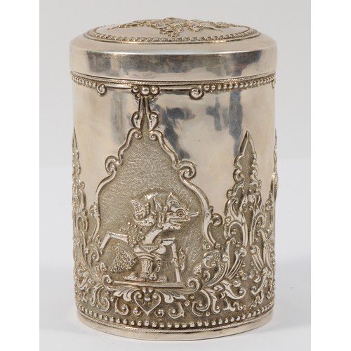 3 - An Indonesian Yogya 800 standard silver repousse lidded jar, signed UD, Deluxe within a flower, 7 x ... 