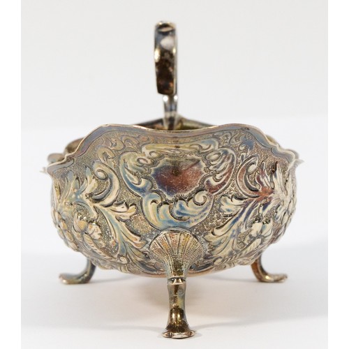 16 - A Victorian silver sauce boat, London 1889, with embossed and chased floral decoration, 11.5cm, 79gm