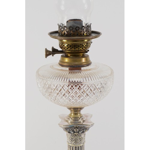 25 - A late 19/early 20th Century electroplated oil lamp, by Hawksworth, Eyre & Co., the cut glass bowl w... 