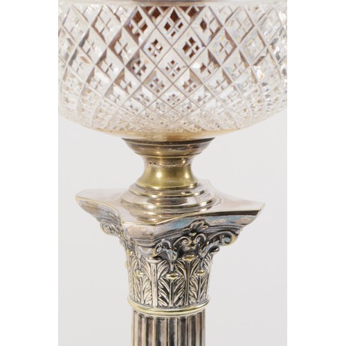 25 - A late 19/early 20th Century electroplated oil lamp, by Hawksworth, Eyre & Co., the cut glass bowl w... 