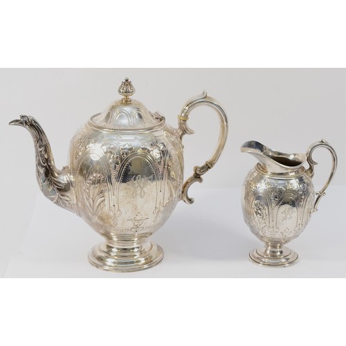 22 - An Elkington & Co Victorian silver teapot, Birmingham 1871, with embossed floral decoration and eagl... 