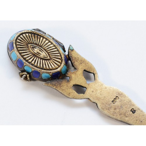 1 - A German early 19th Century enamel and 800 standard silver gilt Egyptian revival spoon, with Moses b... 