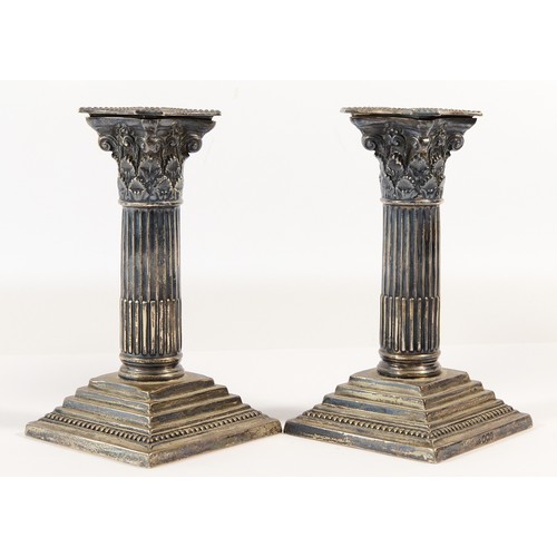 30 - A pair of Victorian silver Corinthian column candlesticks, Sheffield 1894, by Mappin & Webb, with de... 